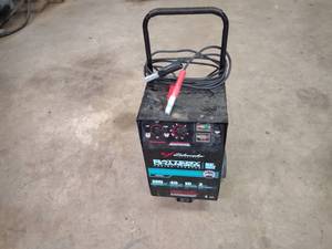 lot 24 image: Schumacher 200 Amp Battery Charger...