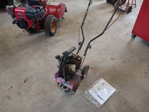 lot 42 image: Troy-Bilt 10 Roto-Tiller, Honda GX...