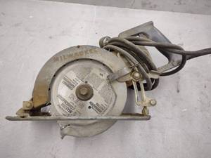 lot 143 image: Milwaukee Worm Gear Circular Saw...