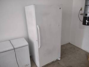 lot 579 image: GE Upright Freezer...