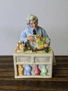 lot 711 image: Royal Doulton The China Repairer Figurine HN 2943 - SIGNED