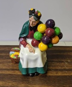 lot 713 image: Royal Doulton The Old Balloon Seller Figurine HN 1315