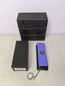 lot 410 image: Lot of Four Guard Dog Security Hornet Stun Guns