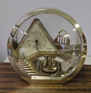 lot 521 image: Vintage Rhythm Quartz Clock with Pyramid and Angels