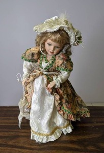 lot 507 image: Porcelain Doll with Stand