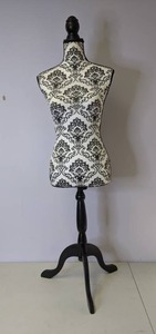 lot 543 image: Patterned Dress Form on Wood Stand