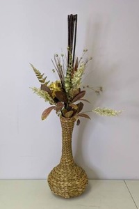 lot 556 image: Wicker Vase w Faux Floral Arrangement