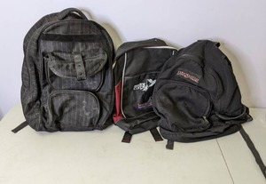 lot 577 image: Three Black Backpacks