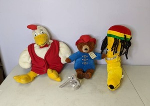 lot 397 image: Paddington Bear & Other Stuffed Animals