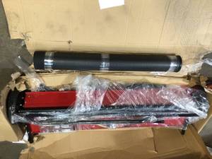 lot 26 image: Everbuilt 48 in. 15 cu. ft. Lawn Sweeper not used see pictures