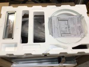 lot 27 image: Over the Range Microwave oven not used see pictures