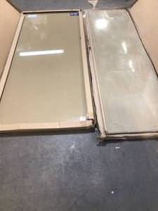 Lot of 1- 30.5 in. x 76 in. Frameless Fixed Glass Shower Door in Chrome Finish and 1- 48 in. x 80 in. Frameless Hinged Reversible Shower Door and Panel in Matte Black