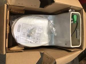 lot 25 image: Eco UltraMax 1-Piece 1.28 GPF Single Flush Round Toilet in Cotton White missing cover  Seat Included by TOTO Customer Returns See Pictures