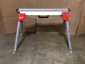 lot 37 image: Folding Miter Saw Stand by Milwaukee Customer Returns See Pictures
