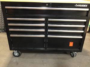 lot 41 image: 46 in. W x 24.5 in. D 9-Drawer Gloss Black Deep Tool Chest Mobile Workbench with Hardwood Top by Husky Customer Returns See Pictures