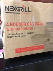 lot 46 image: Nexgrill 4-Burner Propane Gas Grill in Stainless Steel with Side Burner not used