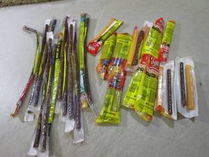 lot 117 image: (EC2) 24 Assorted Smoked Snack Stic...