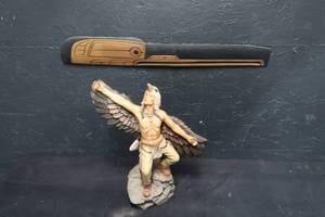 lot 38 image: NATIVE AMERICAN PORCELIAN STAUTE WITH WOODEN RAVEN HEAD