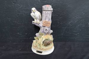 lot 67 image: MUSICAL BOURBON CONTAINER