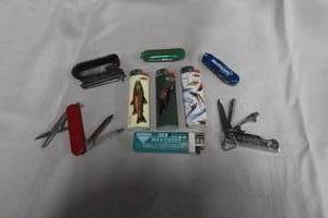 lot 82 image: POCKET KNIVES AND LIGHTERS