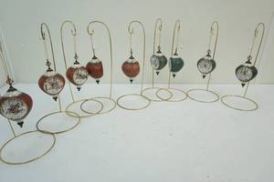 lot 111 image: Hanging Native American dolls