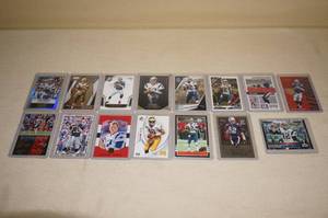 lot 56 image: 15 Tom Brady Cards - Inserts