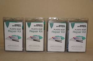 lot 114 image: 4 West System Plastic Boat Repair Kits