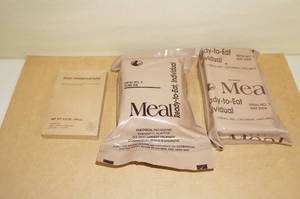 lot 127 image: 2 MRE Meals and a Box of Frankfurters