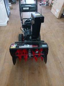 24 in. Two-Stage Gas Snow Blower with Electric Start by Legend Force- not used - SEE PICTURES