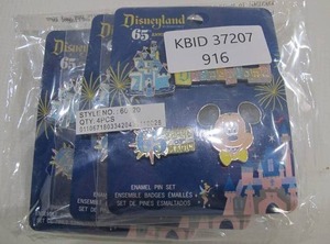 lot 916 image: Lot of 4 Disney Mickey Mouse 65th Anniversary Enameled Pin Set