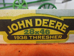lot 10 image: John Deer 128th Threshing Machine