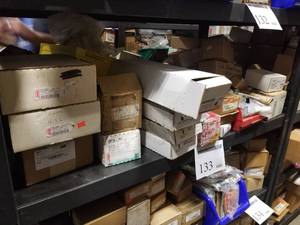 lot 133 image: Motherboards, Mixing Valve, Controllers, Gas Valves, Hose Drain (in cubby)