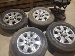 lot 193 image: Lot of (4) Goodyear P27565R18 114T Tires with Ford 18 6-Lug Wheels