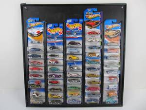 lot 115 image: Large Lot of NIB Hot Wheels Diecast Car wOrganizer Rack