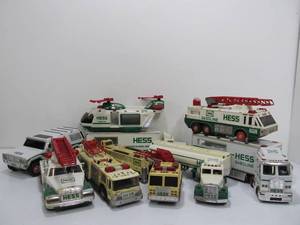 lot 183 image: LARGE Lot of HESS Electric & Diecast Trucks & Vehicles