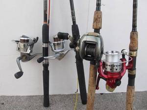 lot 207 image: Nice Clean Lot of 4 Newer Fishing Rods wReels