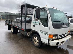 lot 2 image: 2000 Isuzu NPR Landscaping Flatbed Truck