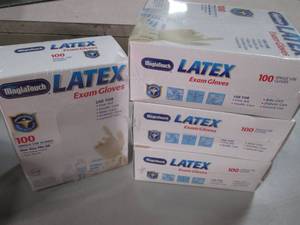 Lot of 4 boxes Latex Exam Gloves. 1...