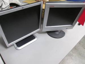2 Computer Montitors. 1 is a Compaq...