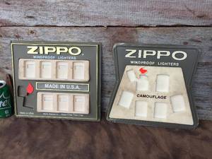 lot 56 image: Vintage 2 Zippo Windproof Lighters Countertop Dealer Displays