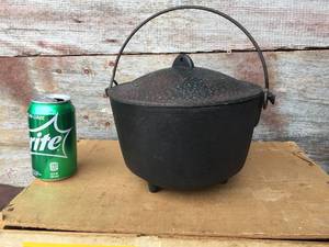 lot 62 image: Cast Iron 3 Footed Pot with Lid