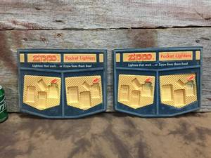 lot 97 image: 2 Vintage Zippo Pocket Lighters Dealer Displays