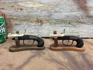 lot 103 image: 2 Vintage Duelling Pistol TableDesk Lighters with Stands