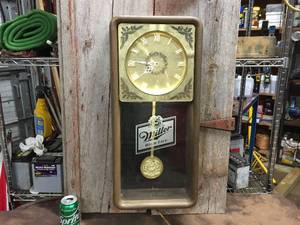 lot 133 image: Vintage Miller High Life Lightup Pendulum Wall Clock