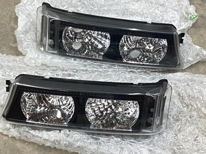 lot 22 image: (1) Pair Of GM Truck Lights & (1) Diesel Exhaust System Exhaust Tip