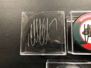 lot of 3 Autographed Hockey Pucks MN Wild ( Matt Dumba, Charlie Coyle, Matt Collen )