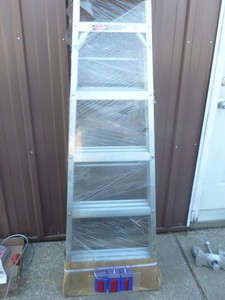 New 6 Aluminum step ladder. As shown.