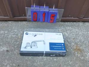 New glacier bay laundry faucet set. As shown.