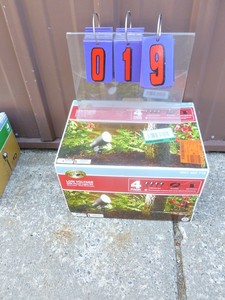 Hampton bay 4 pack low voltage landscape lights. Store return. As shown.