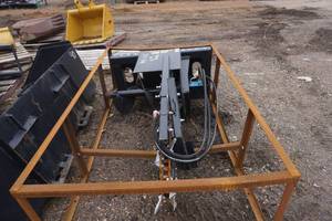 lot 15 image: Brand New Universal Mount Bobcat Skid Loader Skid Steer Hydraulic Trencher Attachment